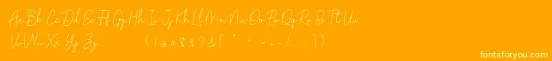 Шрифт Golden Bridge Script – жёлтые шрифты на оранжевом фоне