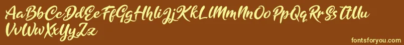 Golden Ranger-Schriftart – Gelbe Schriften auf braunem Hintergrund