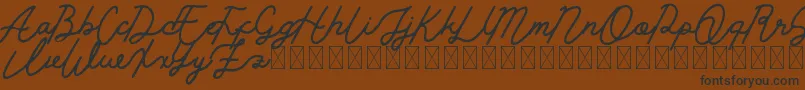 Golden Slayer Font – Black Fonts on Brown Background