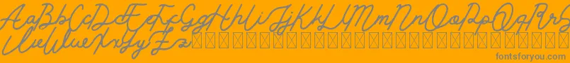 Golden Slayer Font – Gray Fonts on Orange Background