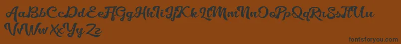 Golliath Font – Black Fonts on Brown Background