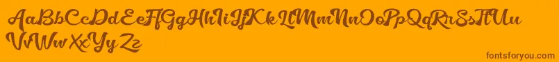 Golliath-Schriftart – Braune Schriften auf orangefarbenem Hintergrund