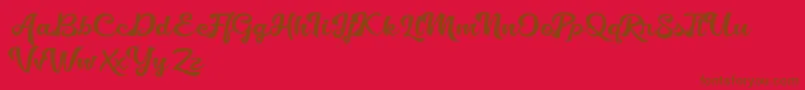 Golliath Font – Brown Fonts on Red Background