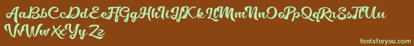 フォントGolliath – 緑色の文字が茶色の背景にあります。