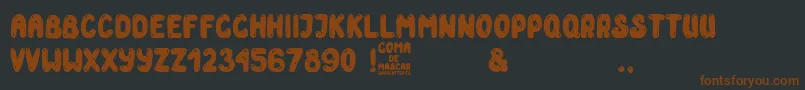 Goma de Mascar Font – Brown Fonts on Black Background