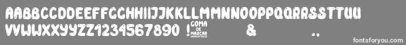 フォントGoma de Mascar – 灰色の背景に白い文字