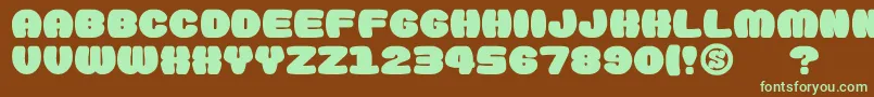 gomarice doughnut monster-fontti – vihreät fontit ruskealla taustalla