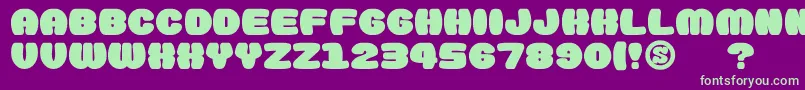 gomarice doughnut monster Font – Green Fonts on Purple Background