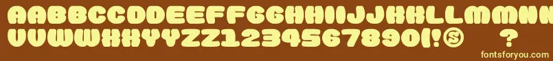 gomarice doughnut monster Font – Yellow Fonts on Brown Background