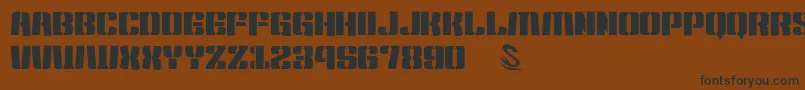 gomarice kensuco stencil-Schriftart – Schwarze Schriften auf braunem Hintergrund