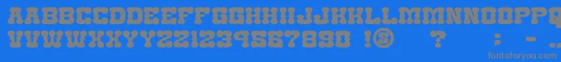 フォントgomarice nantoka western – 青い背景に灰色の文字