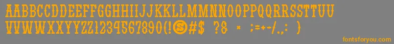 gomarice yatsurano western-Schriftart – Orangefarbene Schriften auf grauem Hintergrund