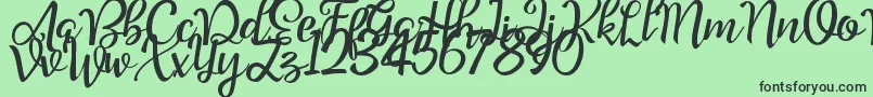 Шрифт Good Feeling Script Demo – чёрные шрифты на зелёном фоне