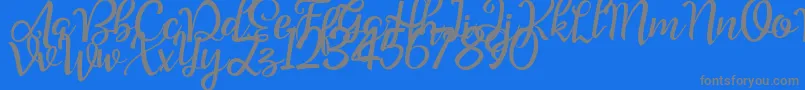 Good Feeling Script Demo Font – Gray Fonts on Blue Background