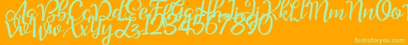Шрифт Good Feeling Script Demo – зелёные шрифты на оранжевом фоне