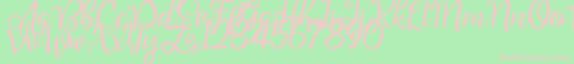 Good Feeling Script Demo-fontti – vaaleanpunaiset fontit vihreällä taustalla