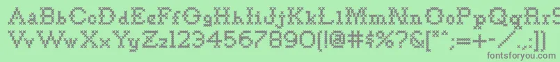Шрифт Goodbye Crewel World NF – серые шрифты на зелёном фоне