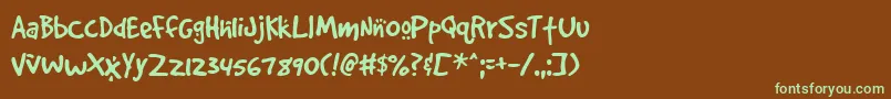 フォントGOODDC   – 緑色の文字が茶色の背景にあります。