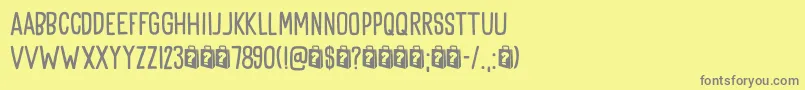 Goodie Bag DEMO-fontti – harmaat kirjasimet keltaisella taustalla
