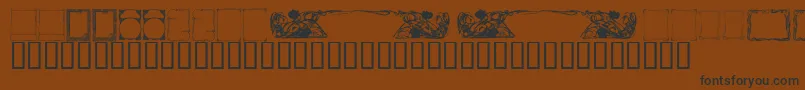 フォントKrDecoFrames – 黒い文字が茶色の背景にあります