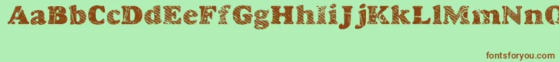 Goodjean-fontti – ruskeat fontit vihreällä taustalla