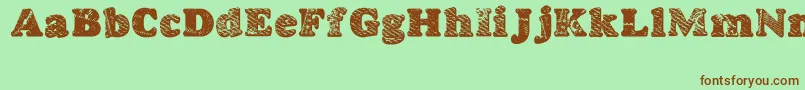 GoodjeanShad Font – Brown Fonts on Green Background