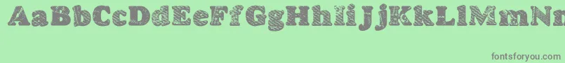 GoodjeanShad Font – Gray Fonts on Green Background