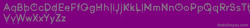 Goofont demo-fontti – harmaat kirjasimet violetilla taustalla