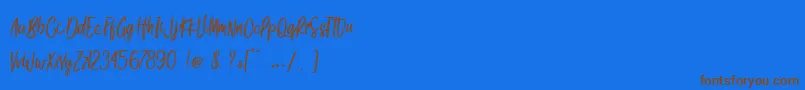 Fonte Gook Kitt   Personal Use – fontes marrons em um fundo azul
