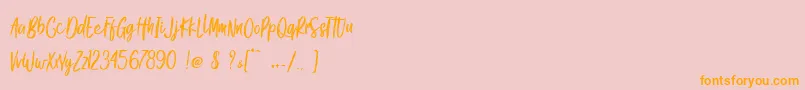 Fonte Gook Kitt   Personal Use – fontes laranjas em um fundo rosa