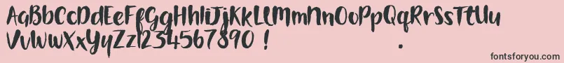 Saiba mais sobre a fonte GorgeouslyWorld DEMO Fonte GorgeouslyWorld DEMO – fontes pretas em um fundo rosa