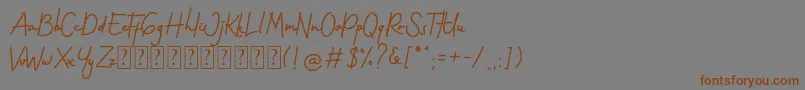 Gothenstone Free Personal Font – Brown Fonts on Gray Background