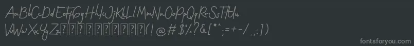 フォントGothenstone Free Personal – 黒い背景に灰色の文字