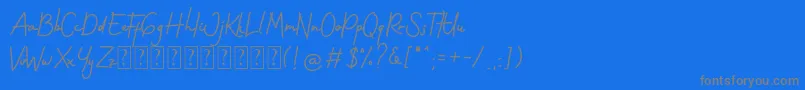 Gothenstone Free Personal-Schriftart – Graue Schriften auf blauem Hintergrund