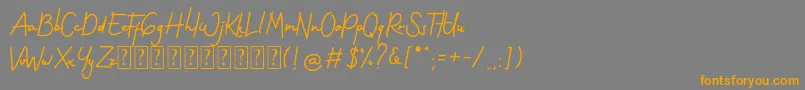 Gothenstone Free Personal Font – Orange Fonts on Gray Background