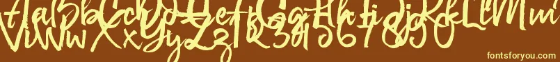 Govani Emir-fontti – keltaiset fontit ruskealla taustalla