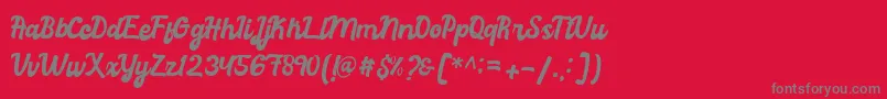 graduation-Schriftart – Graue Schriften auf rotem Hintergrund