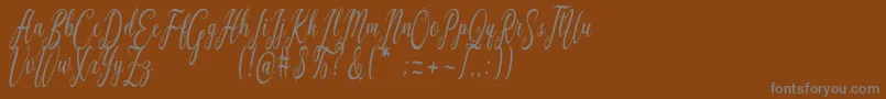 Graf Call free Font – Gray Fonts on Brown Background