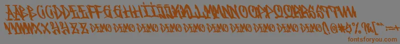 Graffitasi Demo-Schriftart – Braune Schriften auf grauem Hintergrund