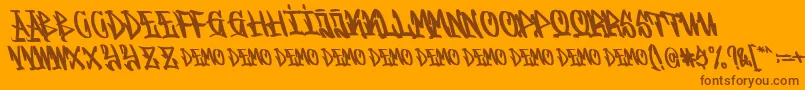 Fonte Graffitasi Demo – fontes marrons em um fundo laranja