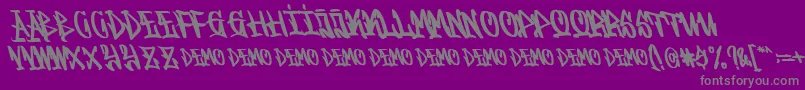 Fonte Graffitasi Demo – fontes cinzas em um fundo violeta