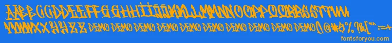 Graffitasi Demo Font – Orange Fonts on Blue Background