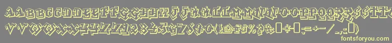 graffiti treat-Schriftart – Gelbe Schriften auf grauem Hintergrund