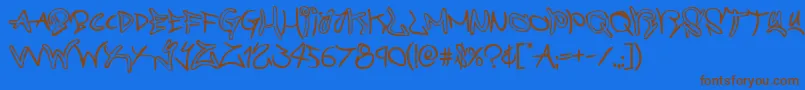Czcionka graffitistreet – brązowe czcionki na niebieskim tle