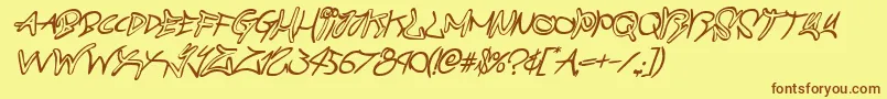 Шрифт graffitistreetcompactital – коричневые шрифты на жёлтом фоне