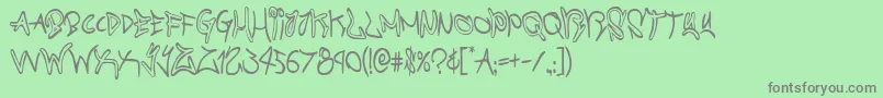 フォントgraffitistreetcond – 緑の背景に灰色の文字