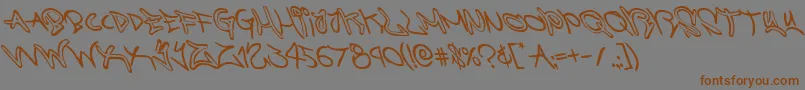 graffitistreetleft-Schriftart – Braune Schriften auf grauem Hintergrund