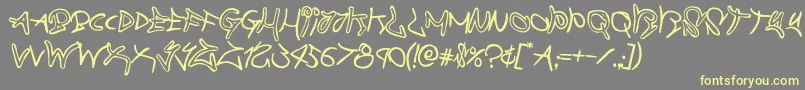 graffitistreetrotate2 Font – Yellow Fonts on Gray Background