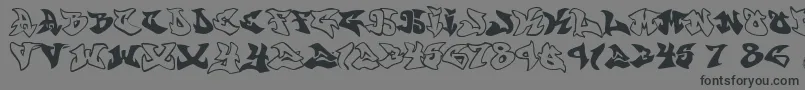 Шрифт graffonti atomic bomb fontvir us – чёрные шрифты на сером фоне