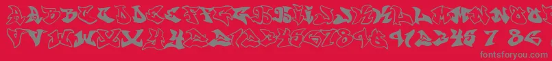 graffonti atomic bomb fontvir us-Schriftart – Graue Schriften auf rotem Hintergrund